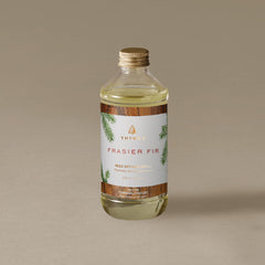 Thymes Frasier Fir diffuser reeds showing simple, maintenance-free diffusion