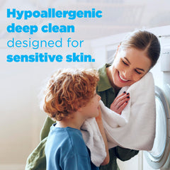 Tide Free & Gentle liquid bottle pour demonstrates easy dosing for convenient loading.