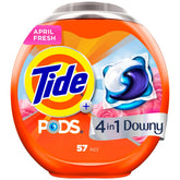 Tide PODS with Downy April Fresh pod in washing drum boosts stain removal and freshness.