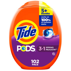 Tide PODS Spring Meadow dispense into washer for easy 3-in-1 clean