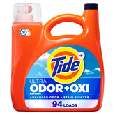 Tide Ultra OXI odor-defense bottle delivering powerful stain and odor removal for fresh results.