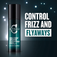 Applying Catwalk Curls Rock Amplifier to towel-dried hair to shape curls.