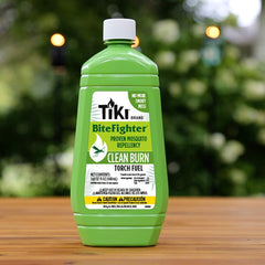 TIKI Clean Burn fuel in a patio torch setup, designed for mosquito repellent use.