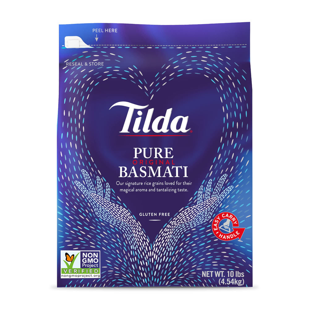 Tilda Pure Basmati Rice bag on kitchen counter with resealable packaging preserving freshness.