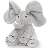 Tippi Peek-a-Boo Elephant sings to baby with a friendly face for interactive play.