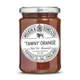 Tiptree Tawny Marmalade jar on a kitchen shelf, rich Seville orange flavor.