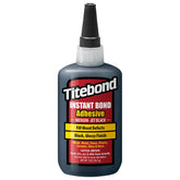Titebond Instant Bond Jet Black bottle close-up highlighting strong, gap-filling wood adhesion.
