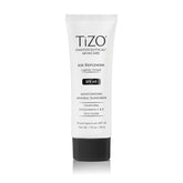 TIZO AM Replenish SPF 40 bottle being poured for easy application