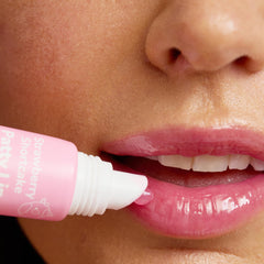 TONYMOLY Milk extract gloss provides lasting moisture without stickiness.