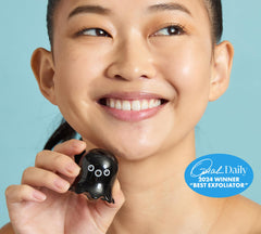 TONYMOLY Tako Pore Charcoal Exfoliator nourishes skin with tea tree and marine extracts.