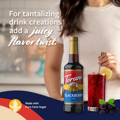 Torani Blackberry Syrup added to a drink for color and flavor