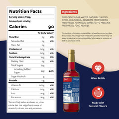 Torani Grenadine Syrup bottle shows vibrant red color for enticing beverages.