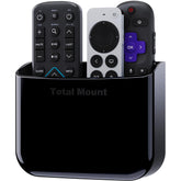 TotalMount hole-free remote holder on wall holding two remotes neatly.