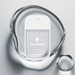 Touchland hydrating hand sanitizer spray beach coco bottle for everyday refreshment.