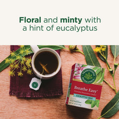 Fresh eucalyptus leaves with Traditional Medicinals Breathe Easy packaging for natural scent