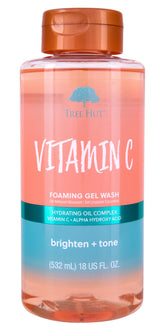 Tree Hut Vitamin C Wash bottle pour highlights citrus scent and refreshing cleanse.