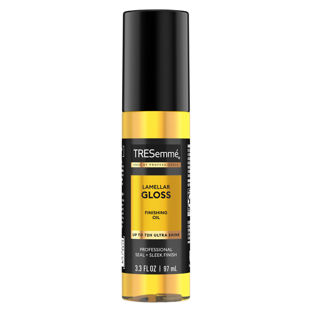 TRESemmé Lamellar Gloss Oil bottle being poured for a sleek, shiny finish.