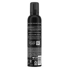 TRESemmé Plumping Mousse being dispensed from the pump for styling
