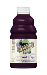 truRoots R.W. Knudsen Organic Just Concord Grape Juice bottle on a kitchen counter, ideal for smoothies.