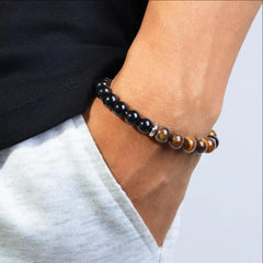 TUBIANCA Tiger Eye beads close-up showing golden hues for confidence and prosperity.