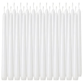 Tuyai 10-inch tall white taper candle on dining table for ambience