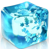TwCare stress ball with ice cube interior and snowflakes for calm focus.
