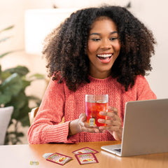 Hot or iced Twinings tea served in a bright, fruity cup.