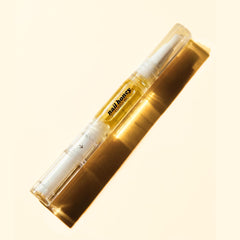 Twinkled T Nail Honey pen cap demonstrating portable cuticle care