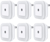 Uigos night light with dusk-to-dawn sensor providing safe living room illumination.