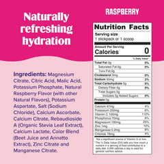 Ultima Replenisher raspberry electrolyte dissolved in a glass of water