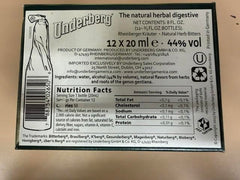 Underberg bottle wrapped in straw-paper packaging emphasizing traditional packaging