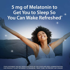 Serving held in hand for bedtime with melatonin gummies.