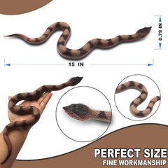 Upitry rubber snakes in garden deterring pests around beds