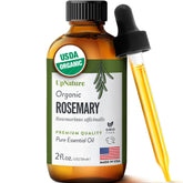 UpNature Rosemary Oil bottle close-up showing pure botanical quality for hair care
