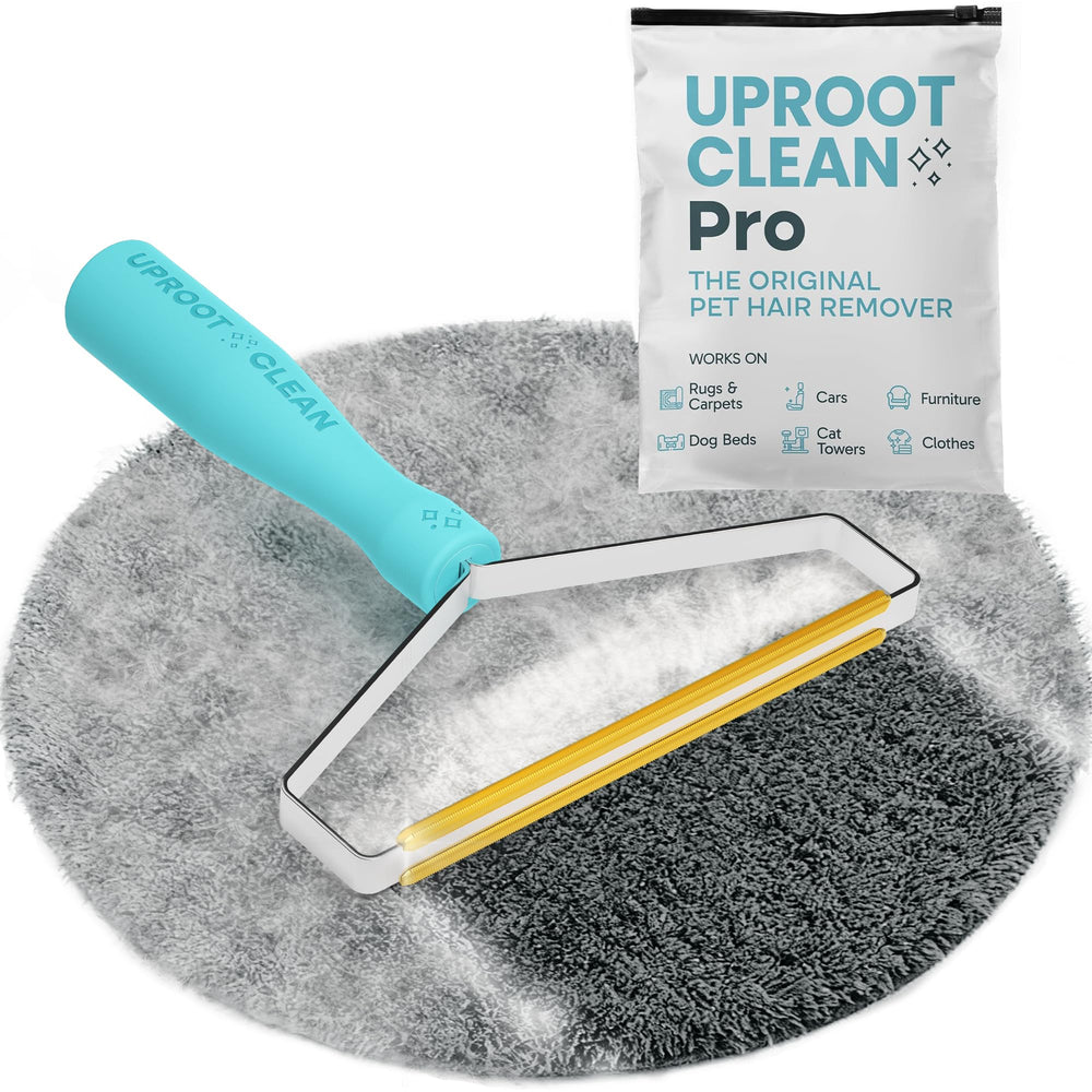 Uproot Cleaner Pro front view shows the pet hair remover tool in action on furniture.
