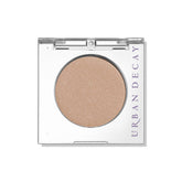 Urban Decay 24/7 Eyeshadow Virgin compact swatch, soft beige satin pigment.