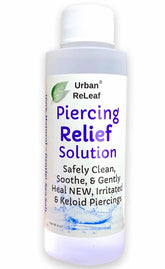 Urban ReLeaf Piercing Relief Solution bottle highlights natural sea salt blend for aftercare.