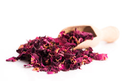 Brewing rose tea with US Wellness Naturals petals for a floral, soothing cup