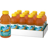 V8 Splash Mango Peach bottle on a counter shows a refreshing fruit flavor in a 16 oz bottle.