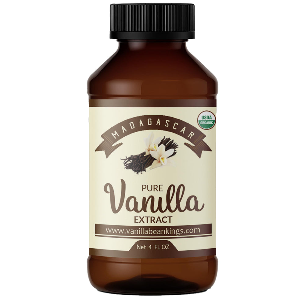 Vanilla Bean Kings Organic Vanilla Extract bottle pouring, ideal for baking and desserts.