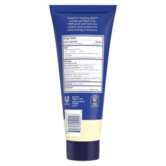 Applying Vaseline lotion to dry hands with quick absorption.