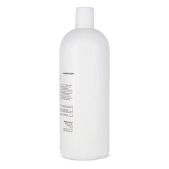 Vaxxen Labs Isopropyl Alcohol 99% poured onto a lint-free cloth for cleaning tasks.