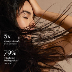 VEGAMOUR GRO Revitalizing Conditioner label close-up highlights vegan formula.