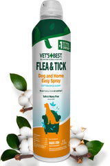 Vet's Best Easy Spray bottle applying Cotton Spice scent to a dog's coat for pest protection.