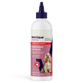 Vetnique Oticbliss bottle-pour shows easy ear rinse for pets.