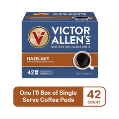 Single-serve pod being inserted into a coffee machine