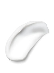 Creamy texture close-up of Amber Romance lotion for quick absorption.