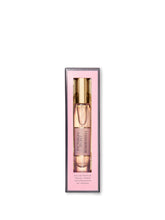 Victoria's Secret Bombshell travel spray bottle front for on-the-go fragrance.