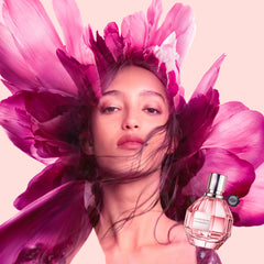 Viktor&Rolf Flowerbomb spray action showing easy on-the-go fragrance use.