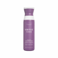 Virtue Flourish Shampoo bottle highlights vegan, color-safe formula for thinning hair.